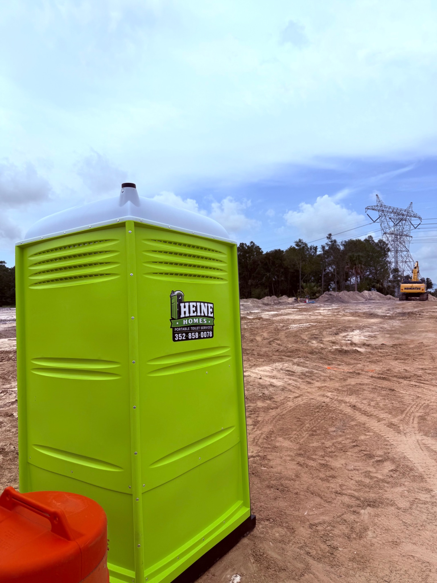 Portable toilet at construction site